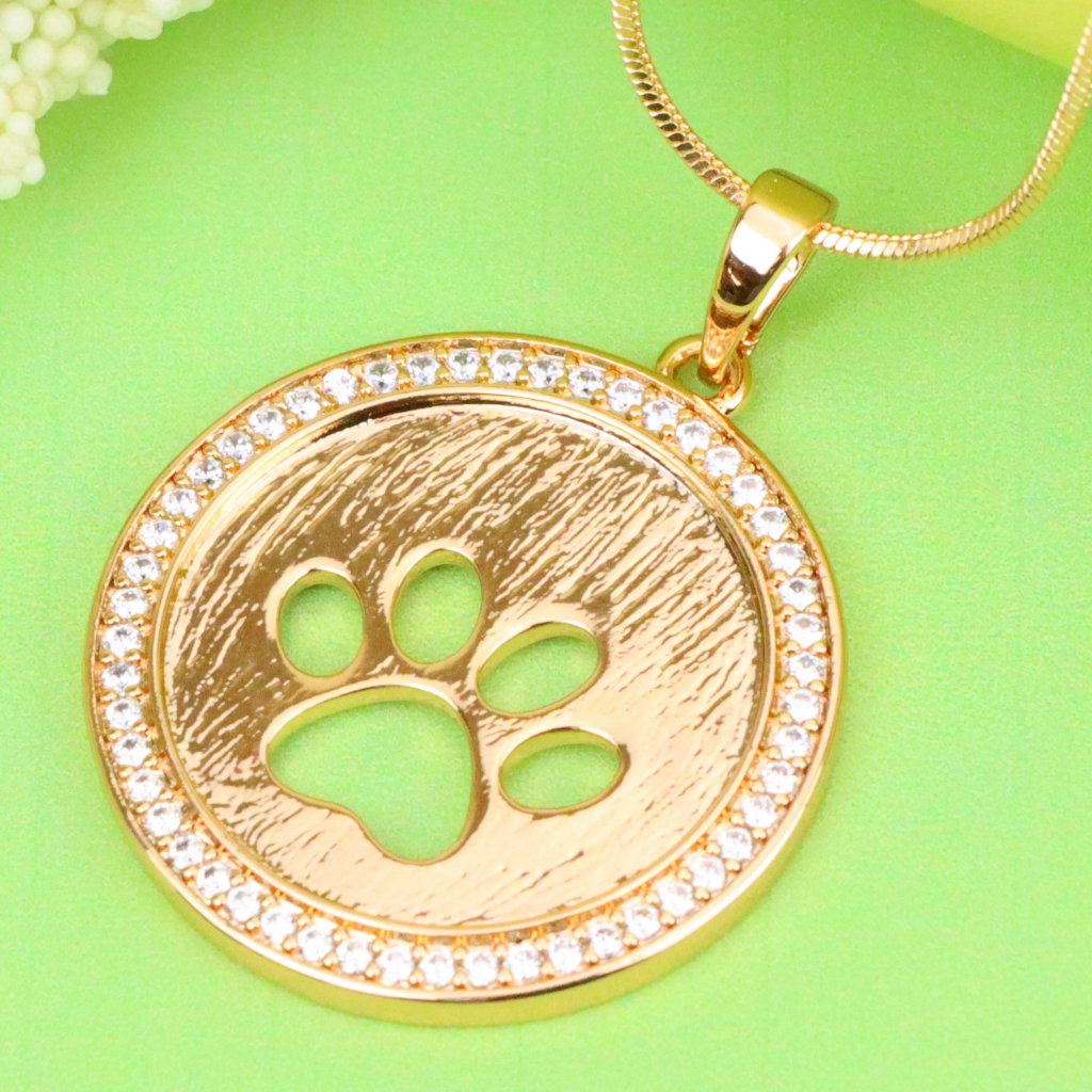Rose Gold Circle Pendant With Paw Print Cutout And Stone Border Xppt1242 29$